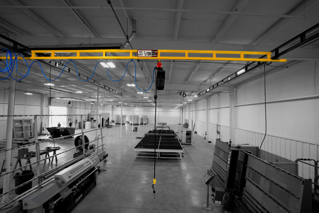 half ton hyperlite ceiling mounted bridge crane in manufacturing setting 2