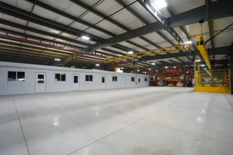 Using concrete of finished flooring is perfect for offices on a mezzanine