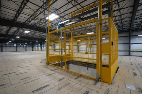 VRC (Vertical Reciprocating Conveyor) in two story building